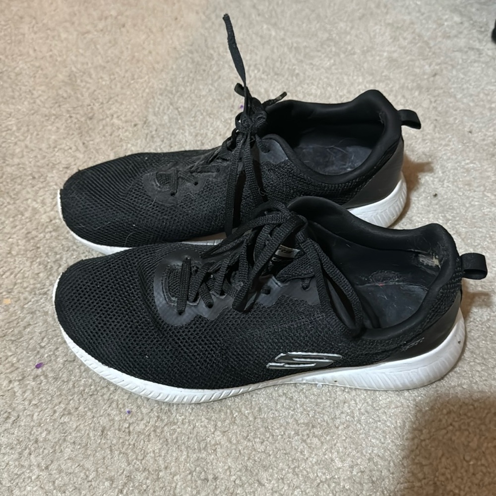 Well worn running sneakers